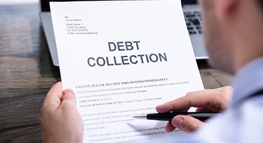 Taxman says help available as debt collection resumes